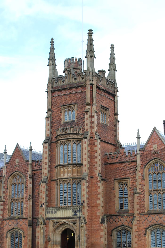 A detailed view of the Gothic architecture at Queen's University in Belfast.