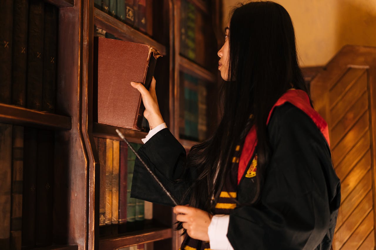 A woman in cosplay retrieves a spellbook in a fantasy library setting.